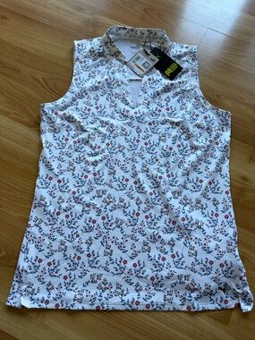 Puma NWT “Micro Floral” women’s sleeveless golf polo size small so soft
